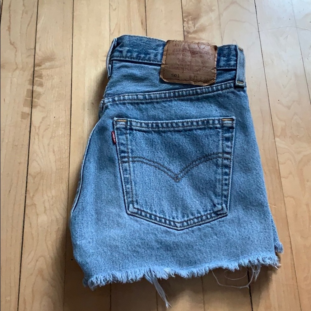 Button fly ripped Levi’s shorts